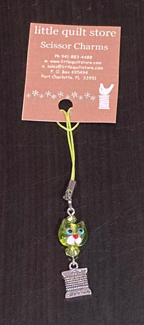 Scissor Charm - green cat face with silver spool of embroidery floss