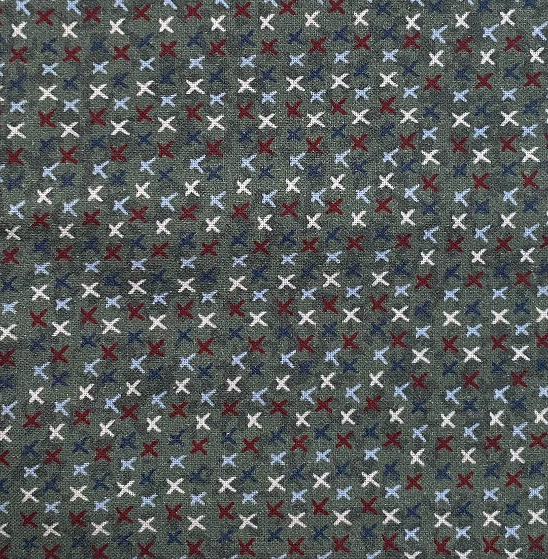 Peace and Joy 80620-10 Love and Kisses - green cotton fabric with white, burgundy, navy and light blue x's