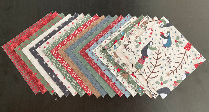 A collection of 18 different fabric squares with various Christmas and winter themed patterns, including penguins, from the Three Wise Penguins fabric collection.
