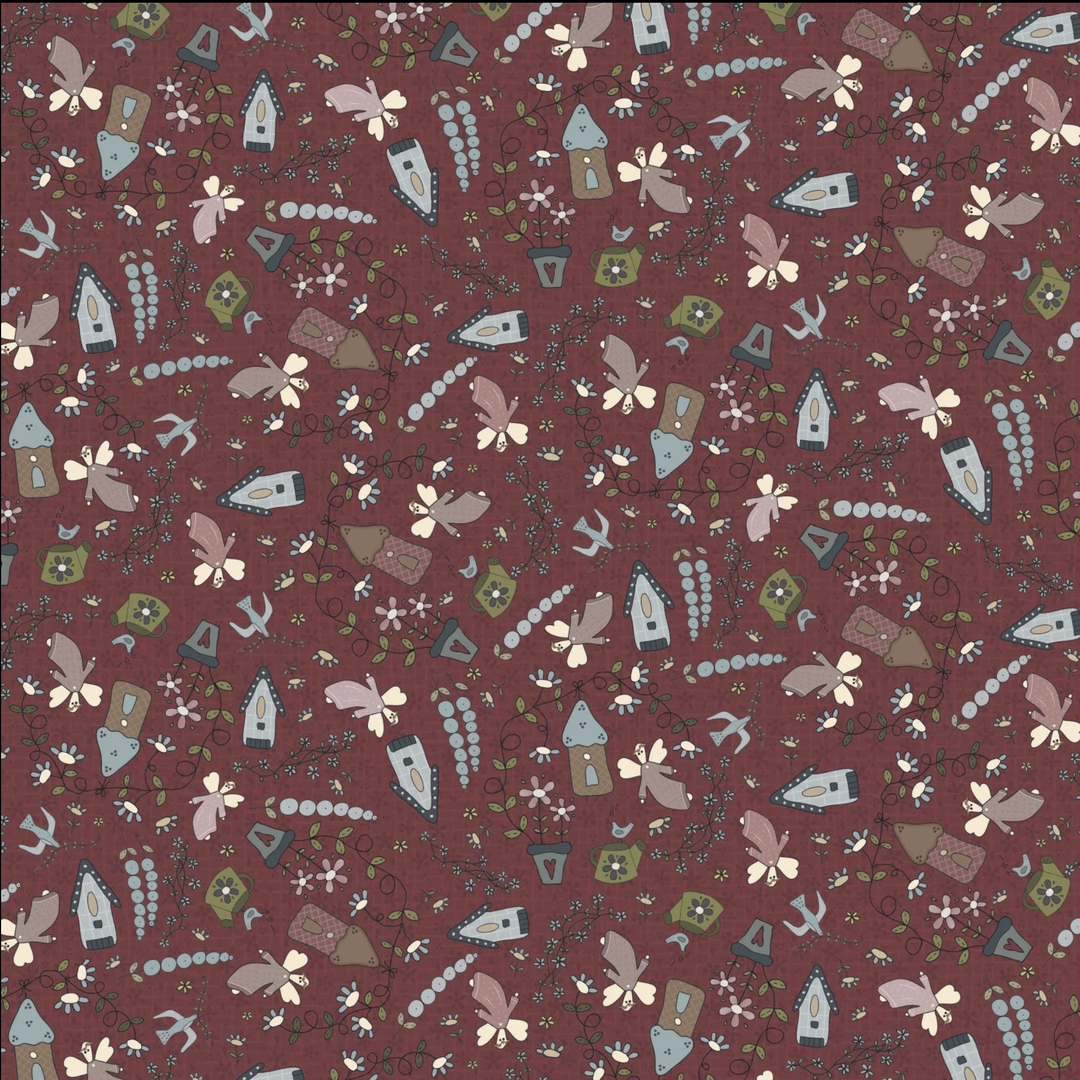 Patterned fabric with small house and nature-themed designs on a red background