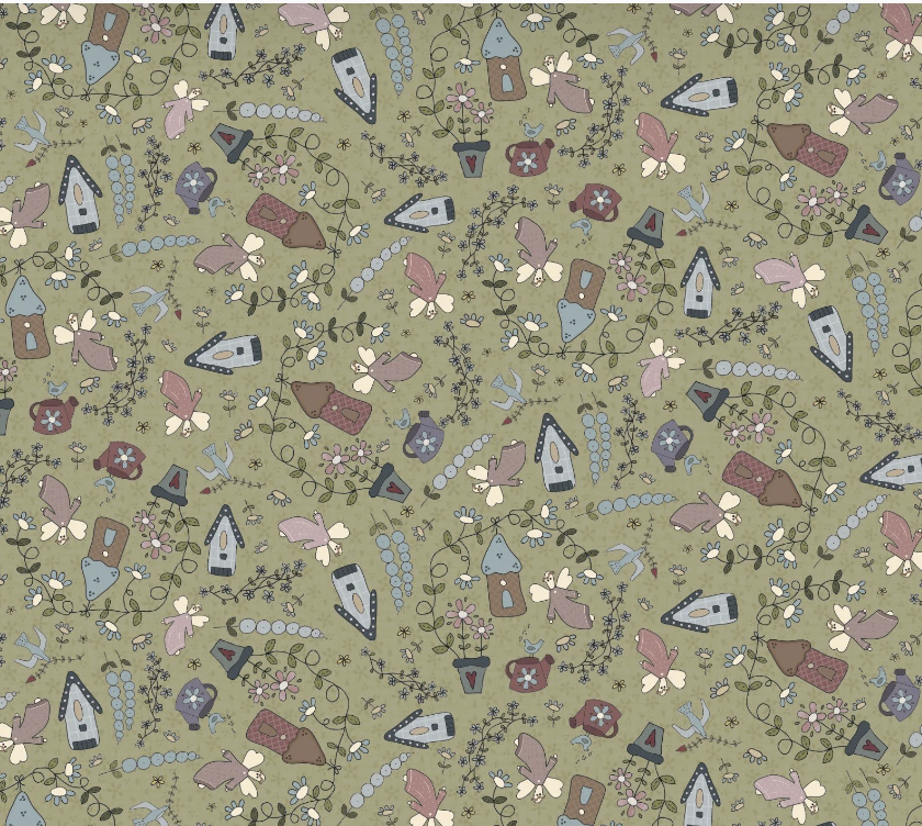 Patterned fabric with small house and flower designs on a green background