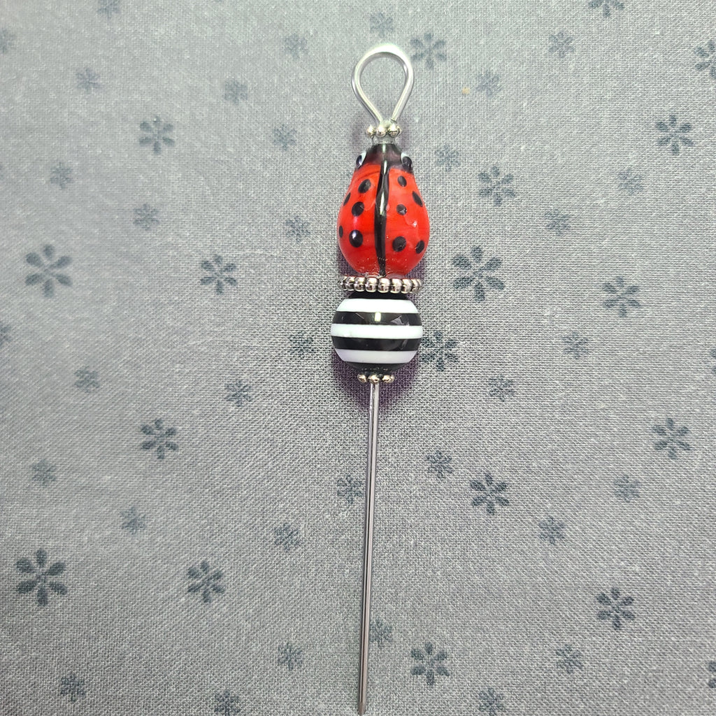 Stiletto-Lady Bug with Black and White Swirled Bead LB033