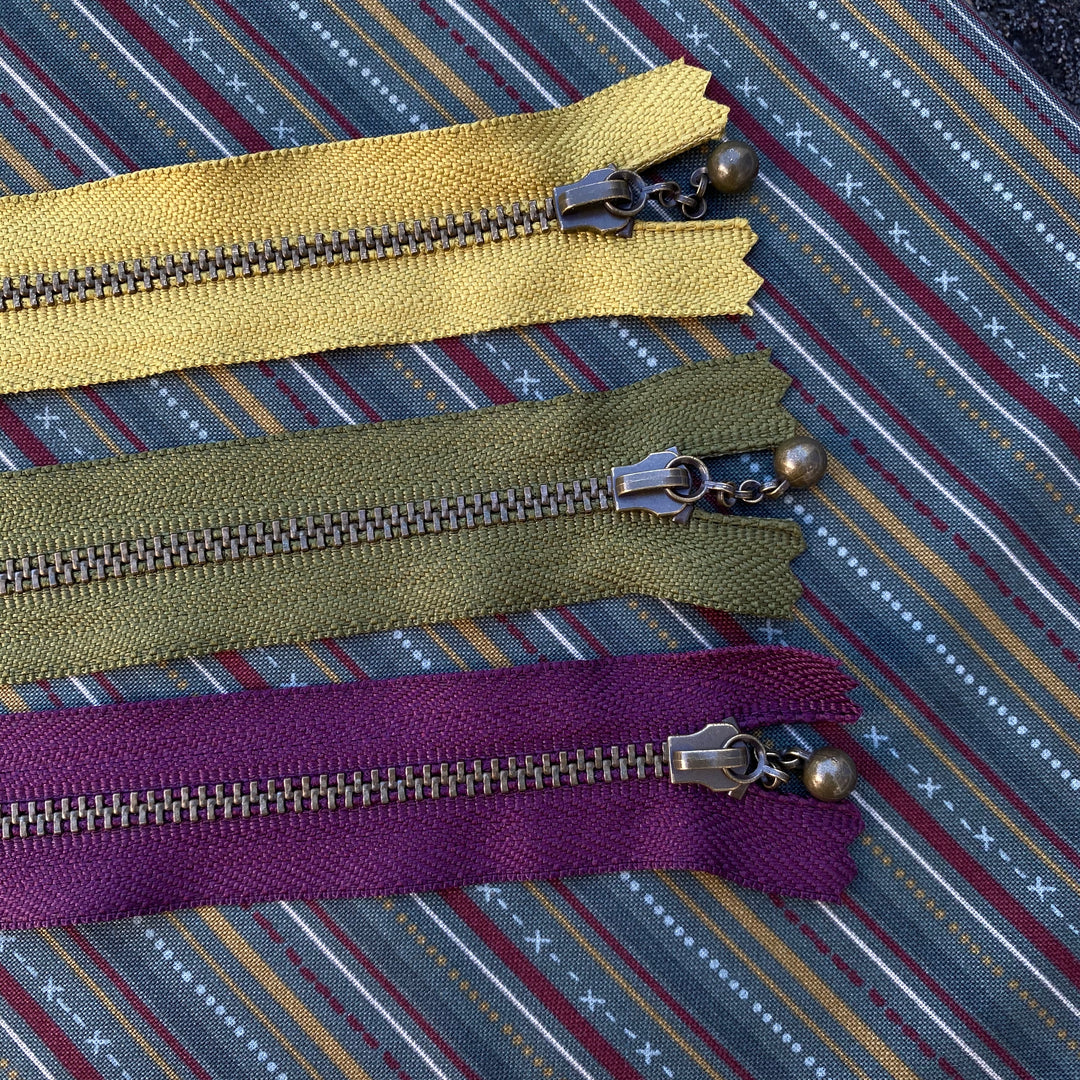 11 1/2" Mixed Zipper Pack (3pcs) - purple, gold, and green