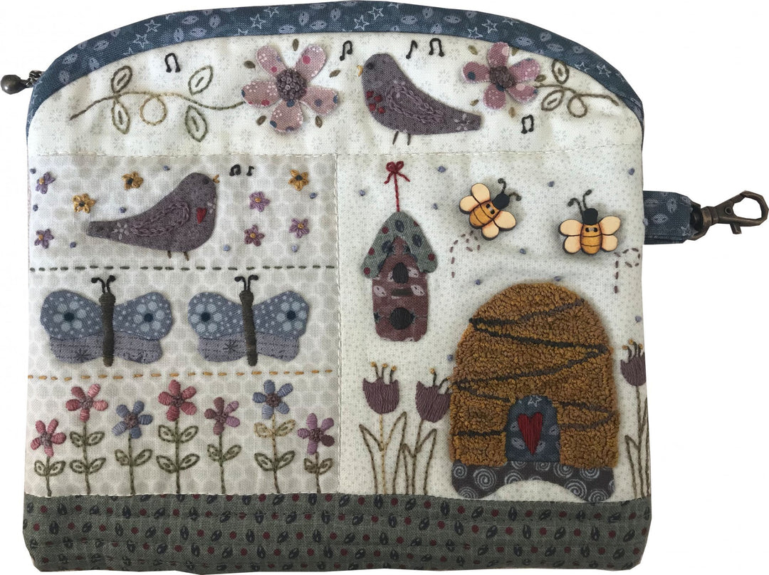 In a Garden Pouch Zippered Pouch by Lynette Anderson